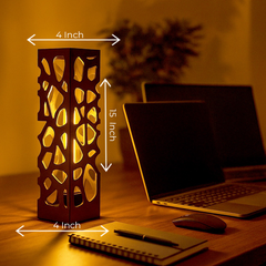 Side angle revealing base details and lamp silhouette