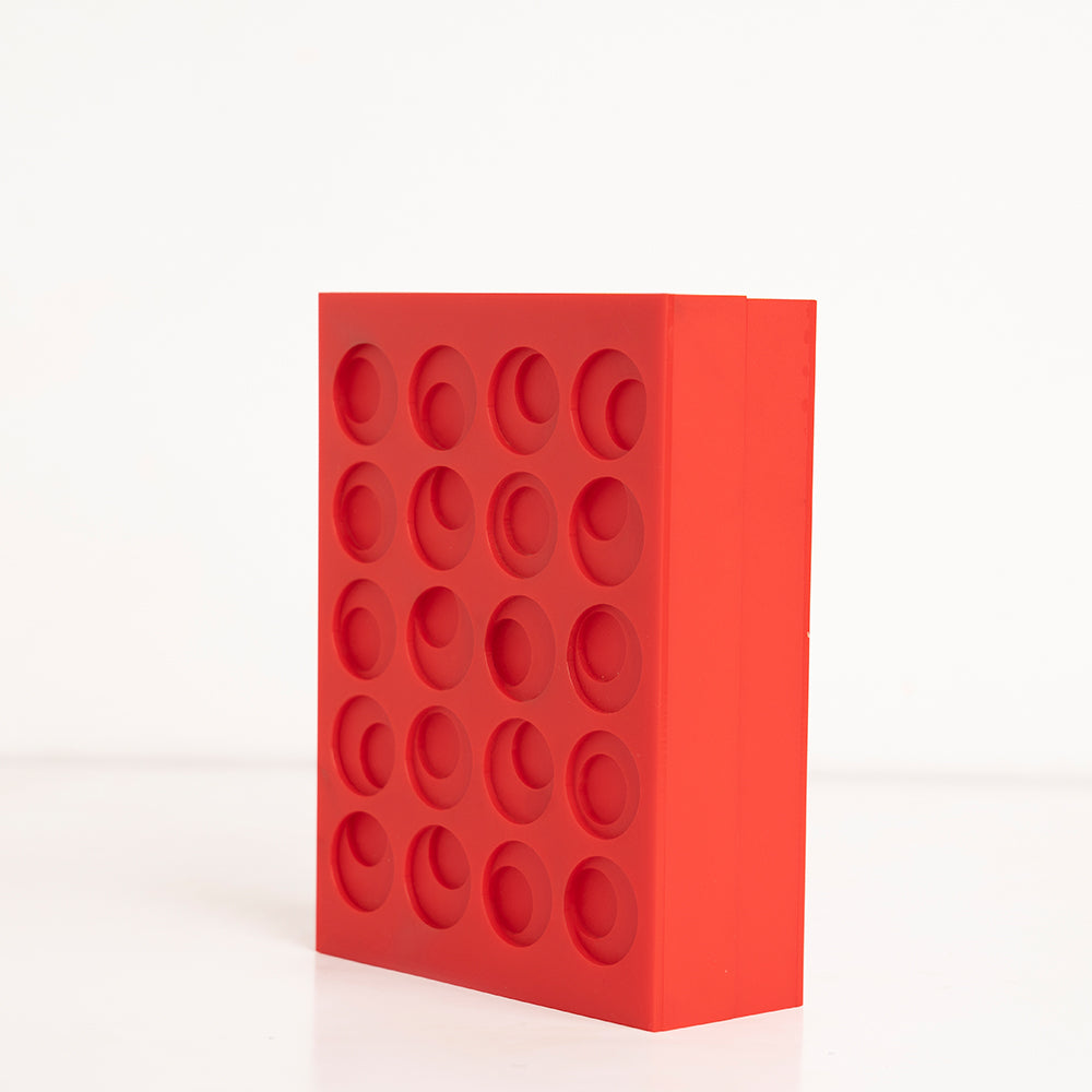 Angled shot of bold red three-layer gift box for elegant gifting