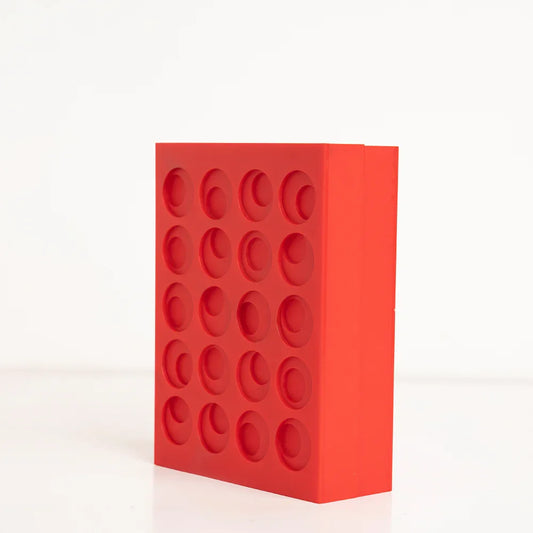 Angled shot of bold red three-layer gift box for elegant gifting