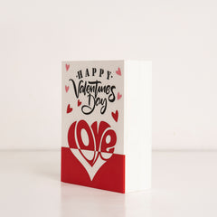 Angled shot of romantic Valentine’s Day acrylic gift box with elegant design