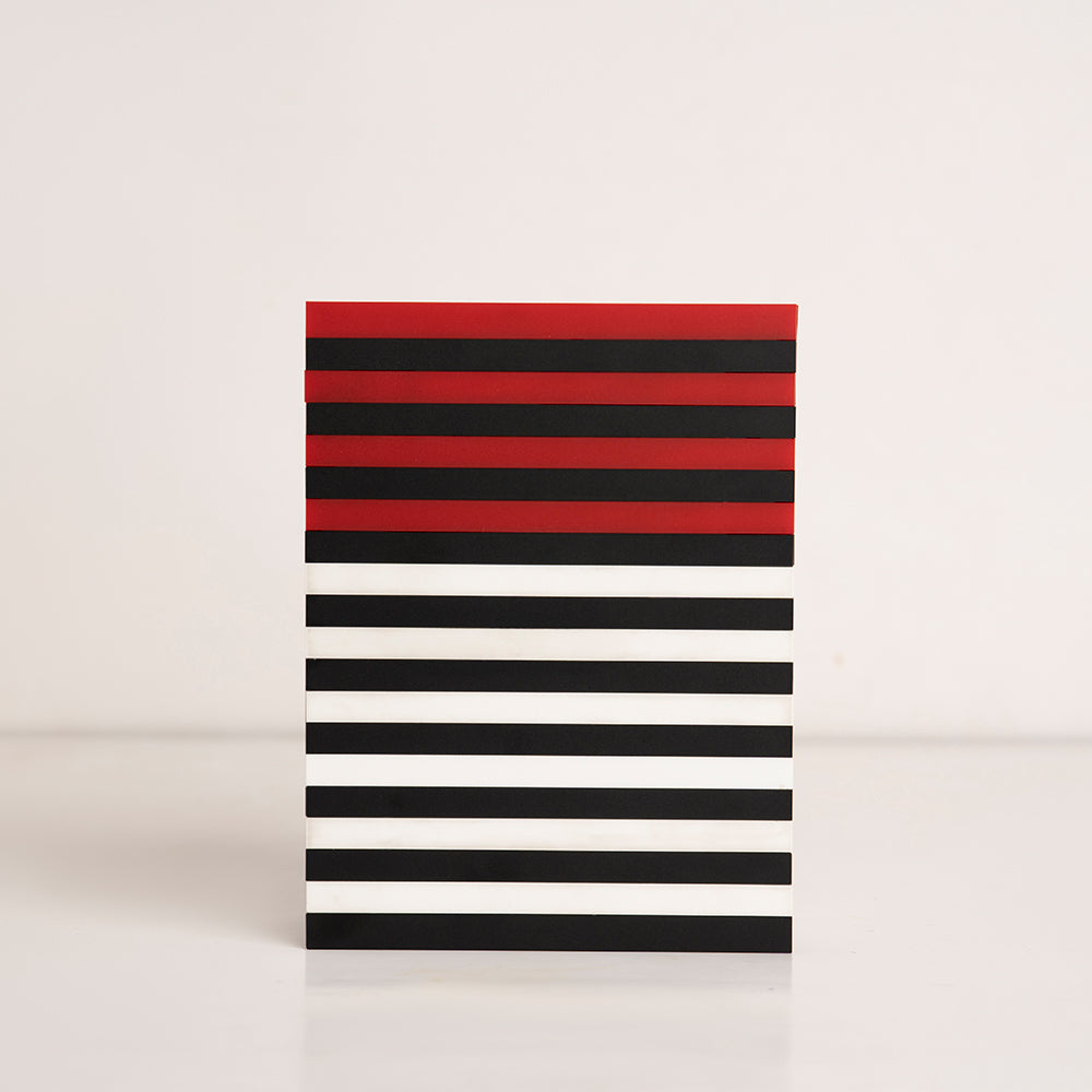 Front view of red, black, and white striped acrylic gift box