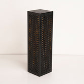 Angled image highlighting lamp's slim form and pattern texture