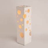 Angled perspective highlighting the sphere's shape and base