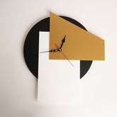 Front view of large open-gear mechanical wall clock in vintage finish