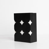 Angled side view of playful star-shaped clear acrylic box