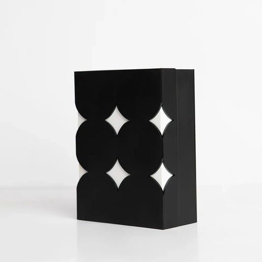 Angled side view of playful star-shaped clear acrylic box