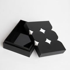 Open view of reusable acrylic gift box with star pattern design