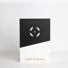 Front view of black and white acrylic gift box with “Best Wishes” engraving
