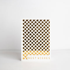 Front view of black and white acrylic gift box with gold square and “Best Wishes” engraving