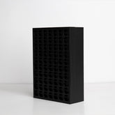 Angled view showing depth and modern black & white design