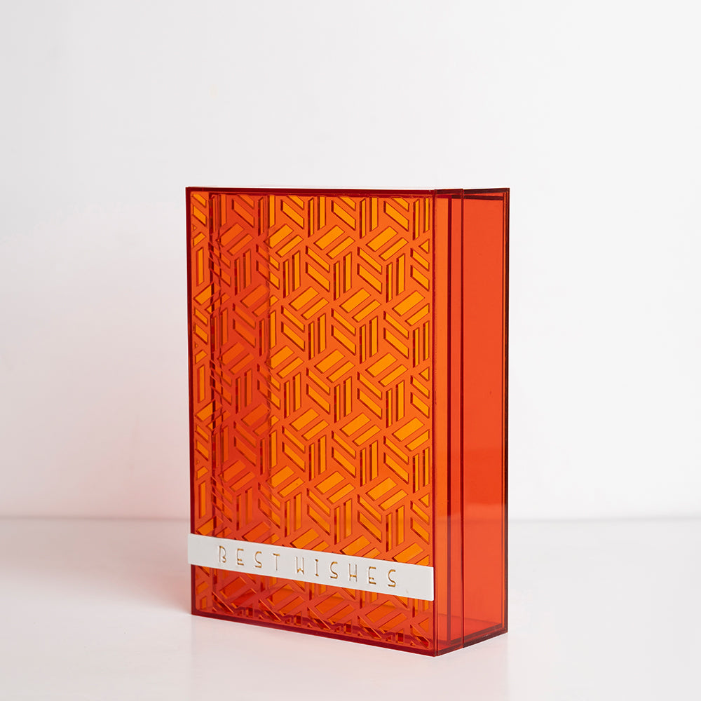 Angled view showing the bold orange color and elegant finish
