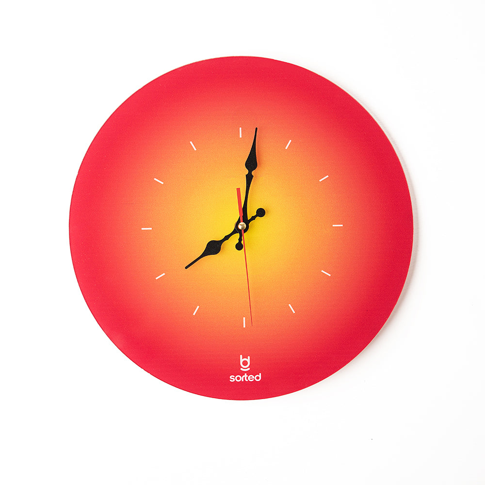 Crimson Dawn Clock – dawn-inspired wall clock with crimson tones