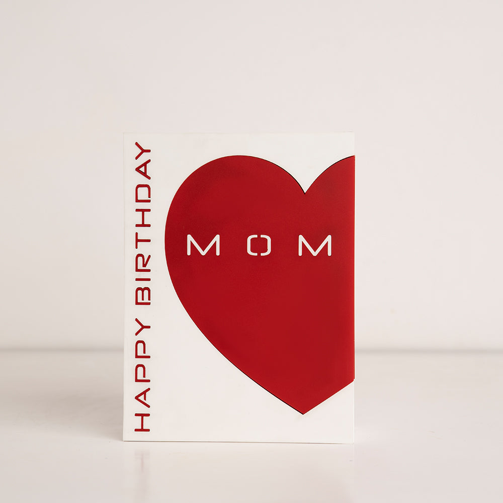 Angled view of acrylic gift box showing "Happy Birthday" text and heart design for mom
