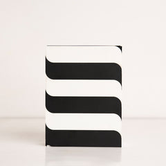 Front view of black and white striped acrylic gift box