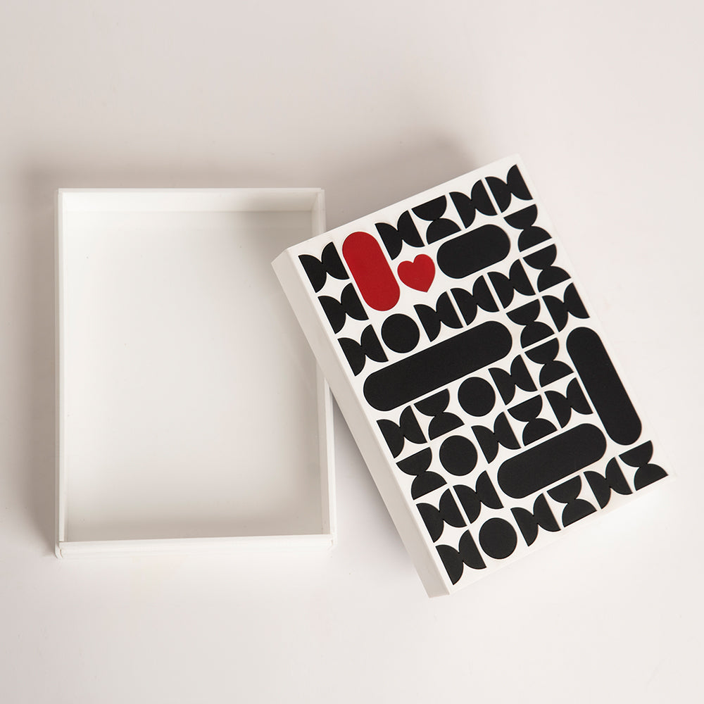 Open view of reusable acrylic gift box with bold pattern design