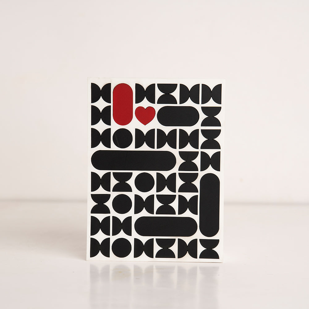 Front view of red, black, and white pattern acrylic gift box