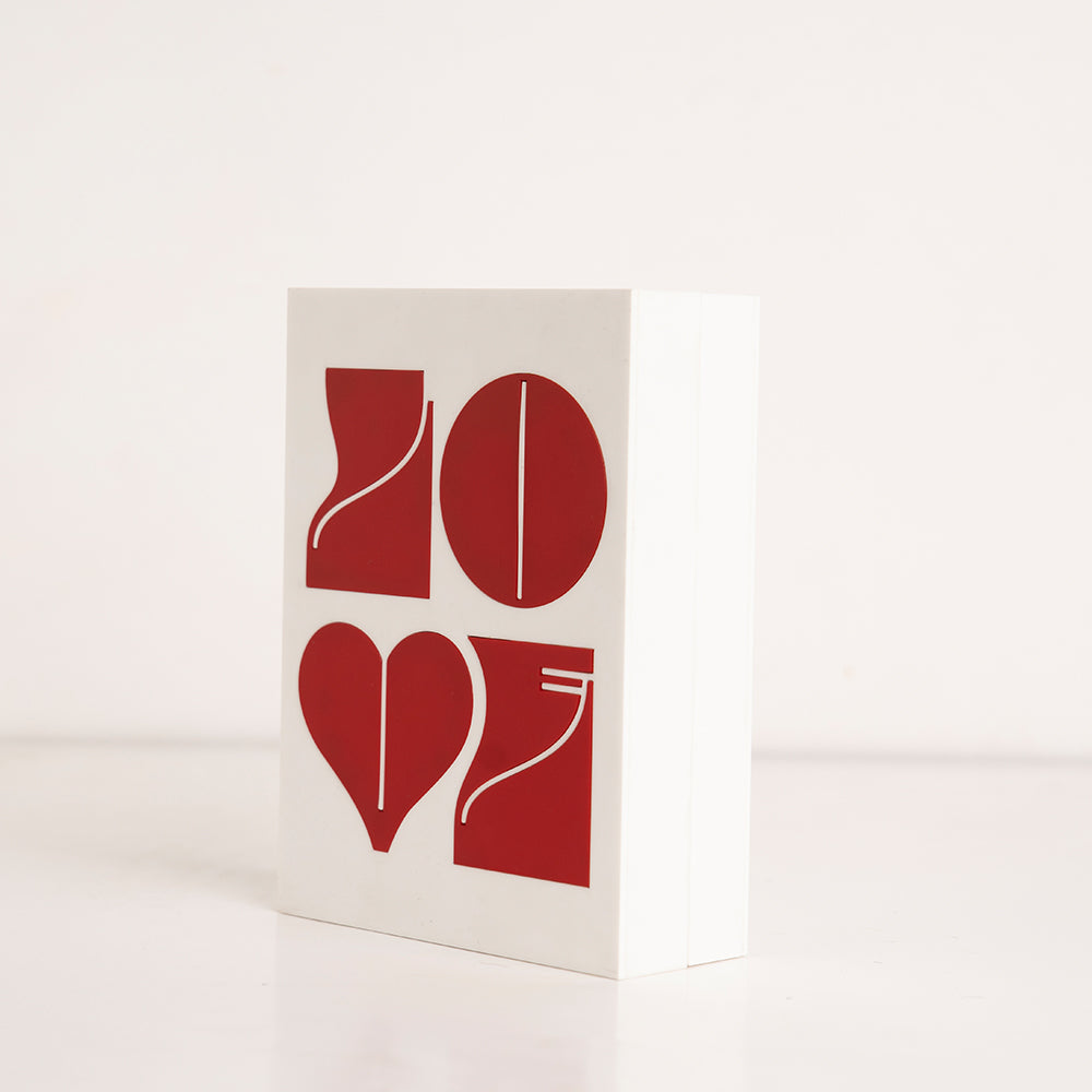 Side angle showing heart symbol design on romantic gift box