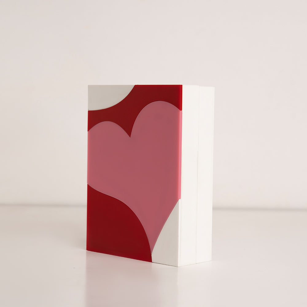 Angled perspective of romantic acrylic heart box for gifting