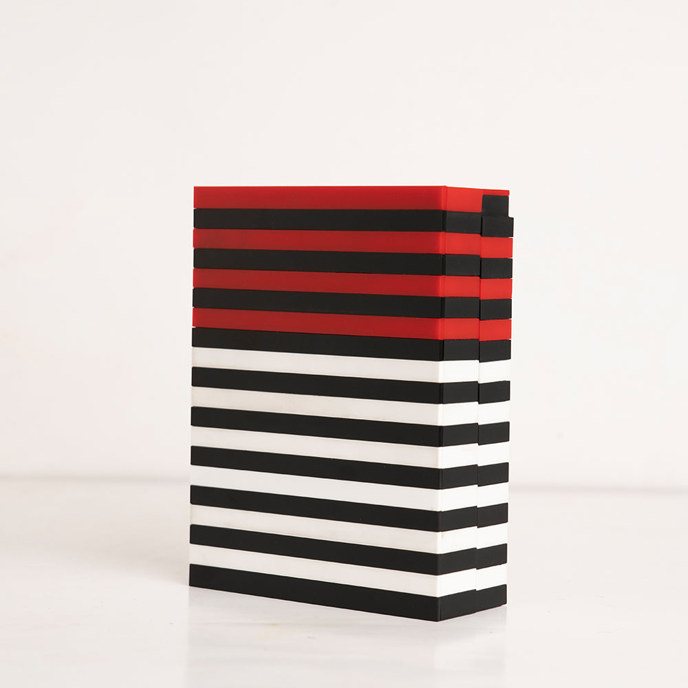 Angled shot of tricolor striped reusable gift box