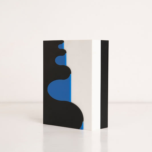 Angled side shot of stylish wave-themed birthday gift box