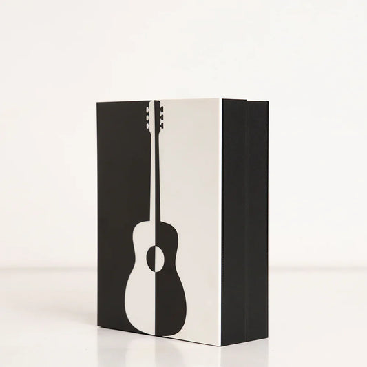 Side angle of reusable music-themed gift box for birthdays
