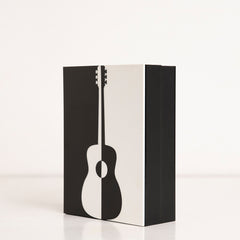 Side angle of reusable music-themed gift box for birthdays
