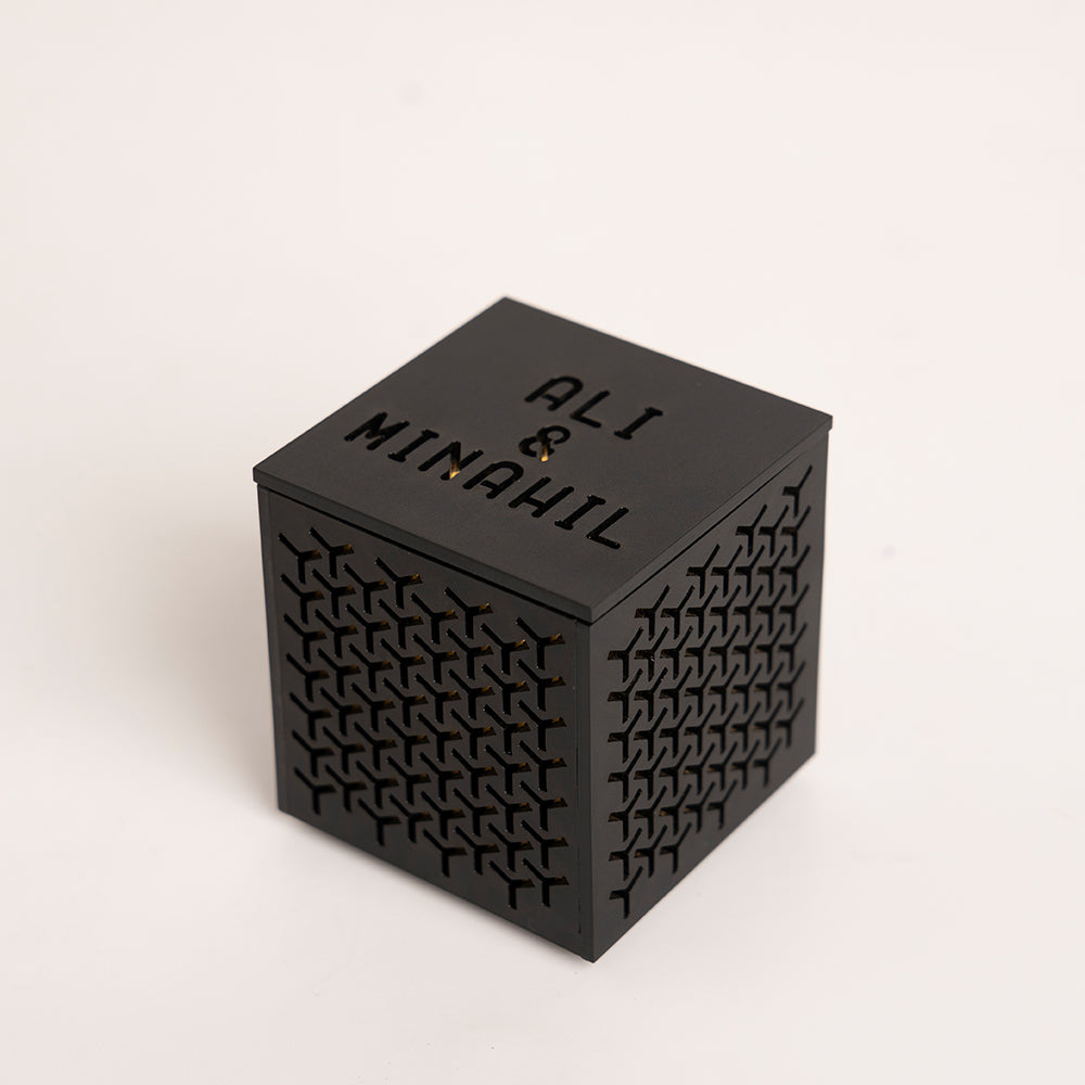 Angled view highlighting cube shape and crosshatch finish