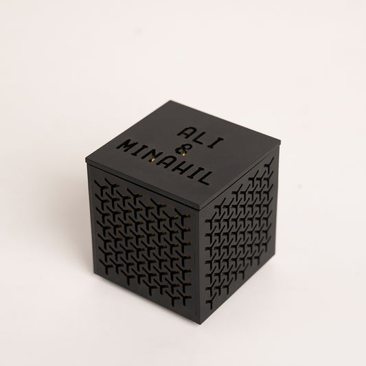 Angled view highlighting cube shape and crosshatch finish