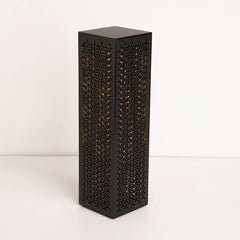 Angled image highlighting lamp's slim form and pattern texture