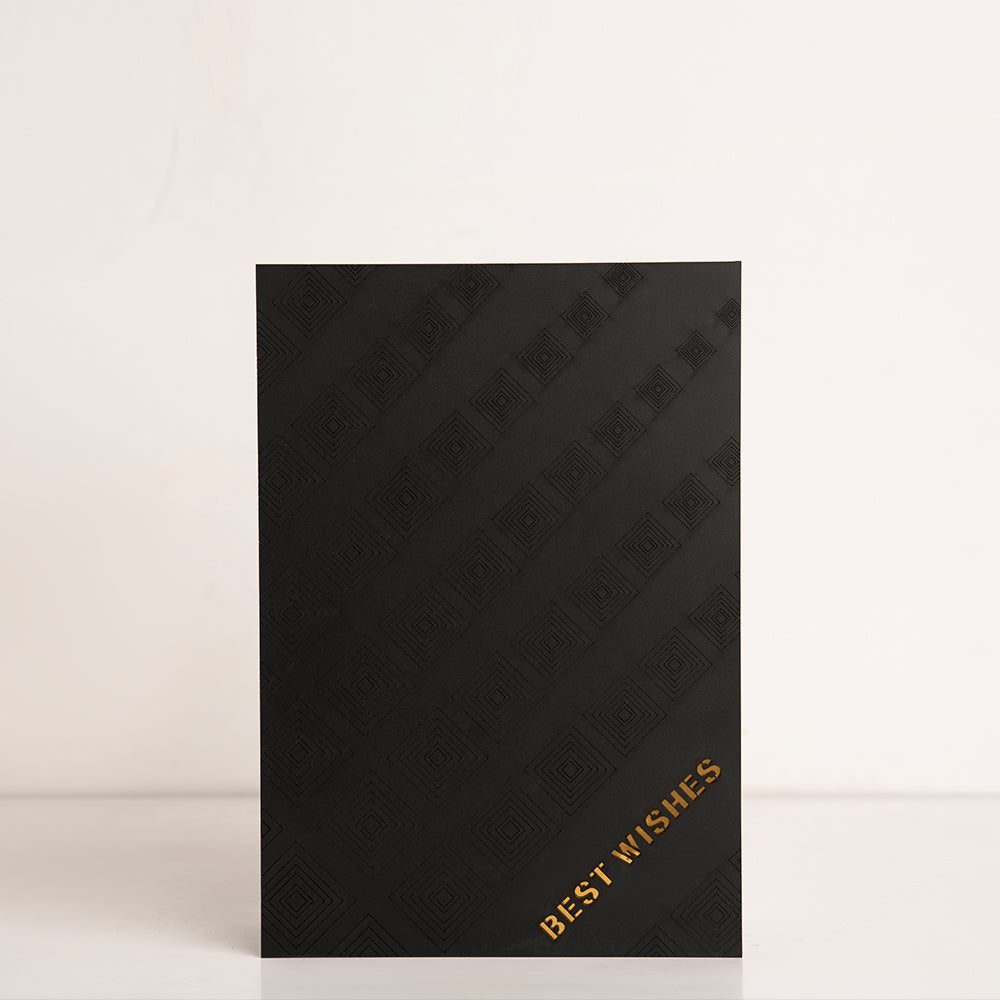 Front view of clear acrylic box with “Best Wishes” engraving