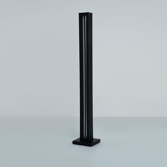  Angled shot highlighting the lamp’s tall structure and glow