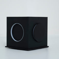 Angled view showing depth and structure of the cubic lamp
