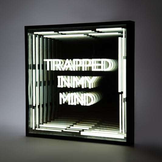 Front shot of Trapped In My Mind Infinity Mirror with deep glowing tunnel