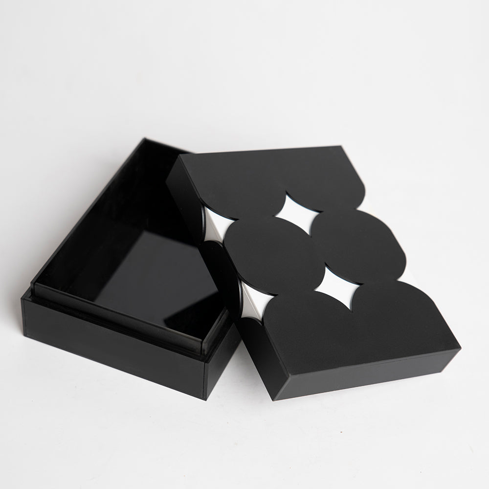 Open view of reusable acrylic gift box with star pattern design