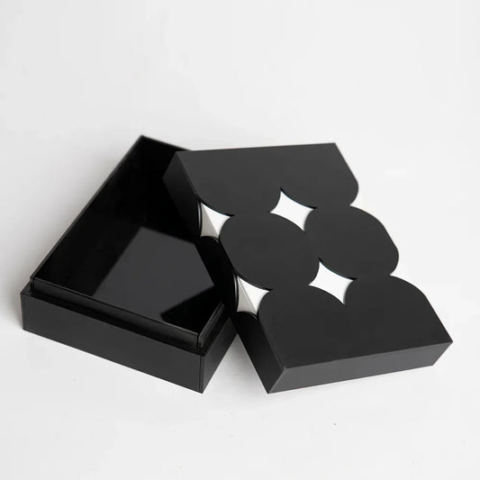 Open view of reusable acrylic gift box with star pattern design