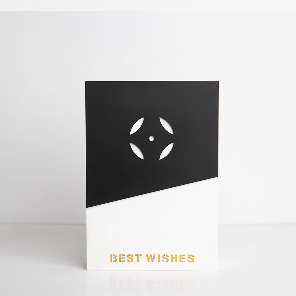 Front view of black and white acrylic gift box with “Best Wishes” engraving