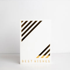 Front view of white acrylic gift box with golden stripes